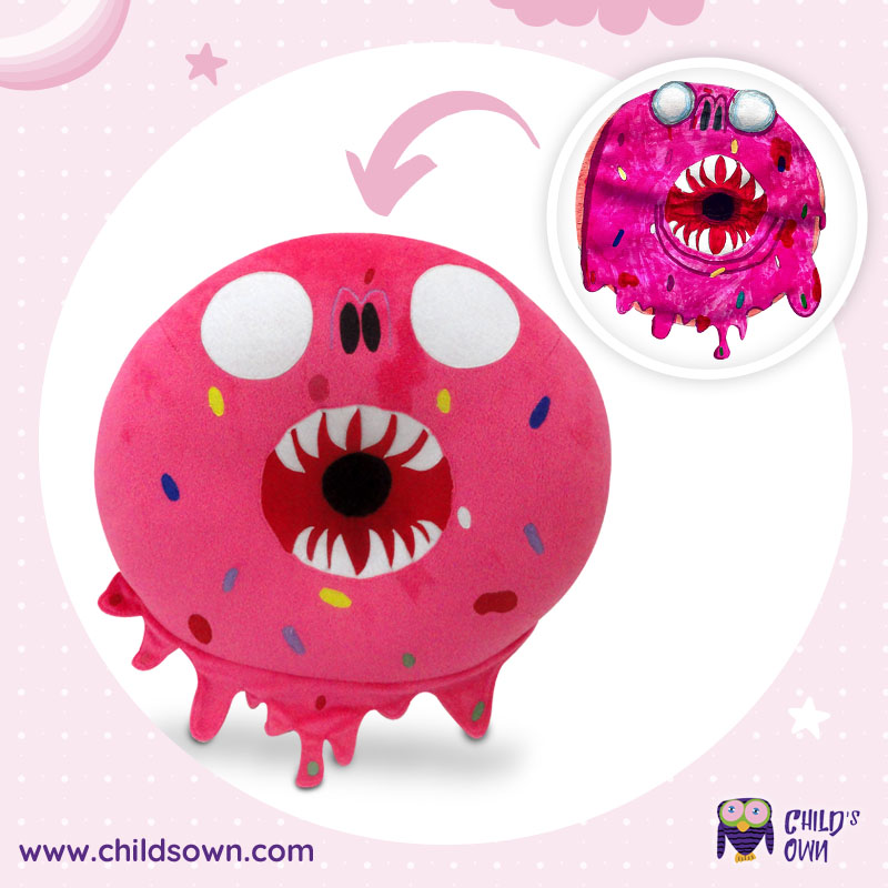 Custom plush of a scary pink donut with sharp teeth, made in the USA.